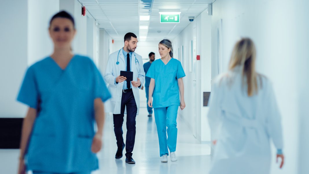 New Mexico lawmakers listen to patients sharing healthcare concerns during a public forum, highlighting issues of access, affordability, and workforce shortages.