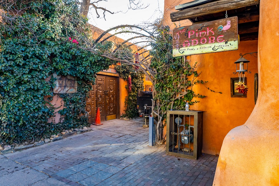 Santa Fe, NM, USA - February 23, 2026: Exterior view of the Pink Adobe restaurant in Old Santa Fe New Mexico