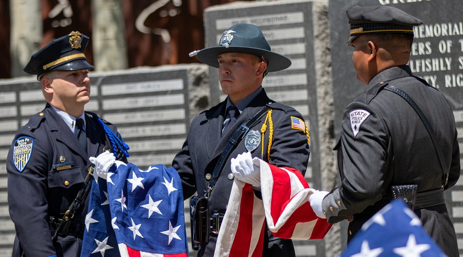 Officers folding flag