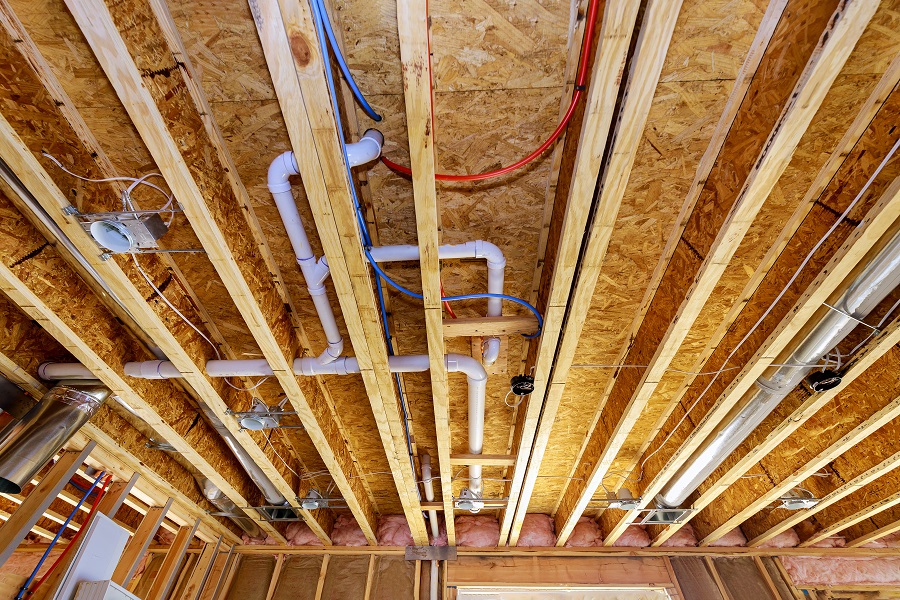 PVC waste water system rough plumbing drainage pipe and fitting complete under construction new home