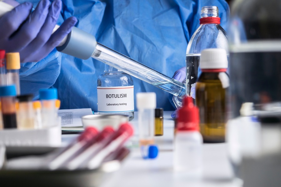 Specialist analyzes botulism Samples in laboratory, conceptual image