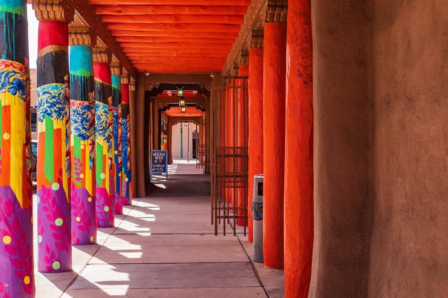 Colorfully painted columns on the plaza in Santa Fe, New Mexico