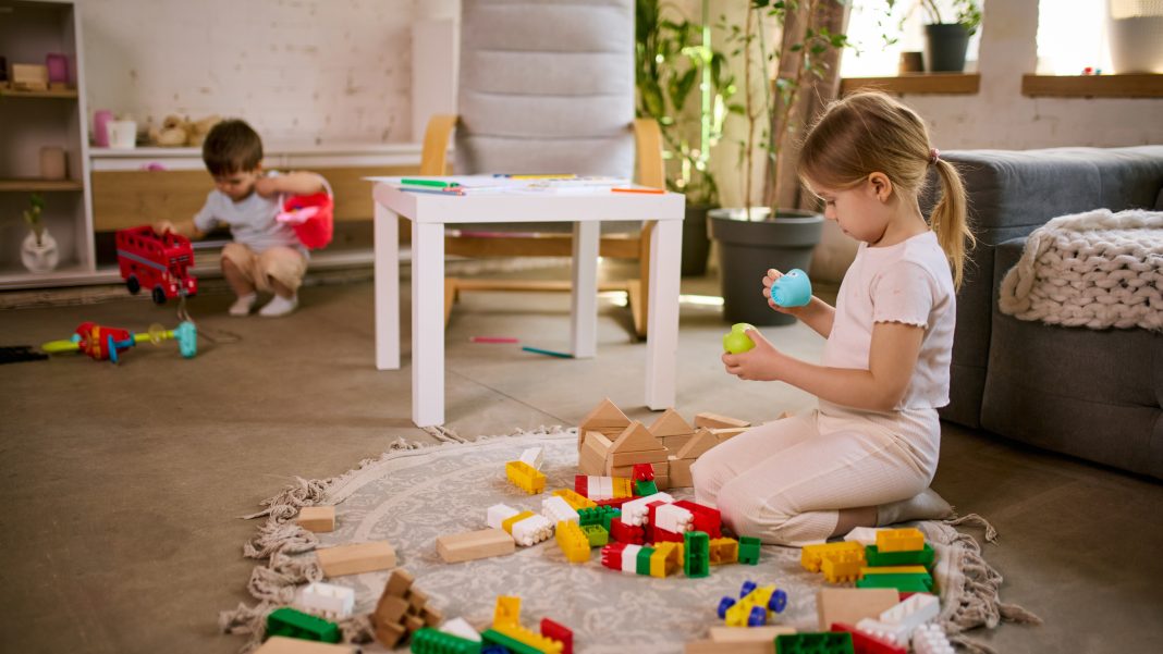Children participate in activities at a New Mexico childcare center as the state expands its free childcare system for eligible families.