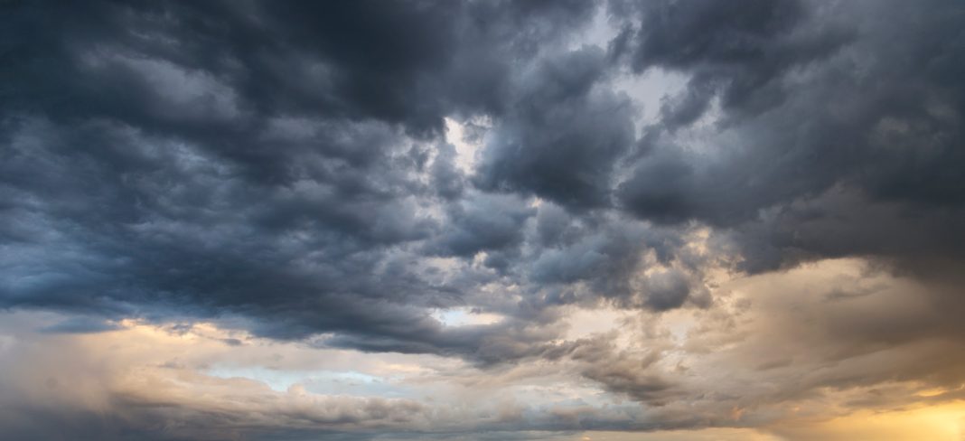 Dark monsoon clouds build over New Mexico as thunderstorms bring heavy rain, lightning, and gusty winds across parts of the state.