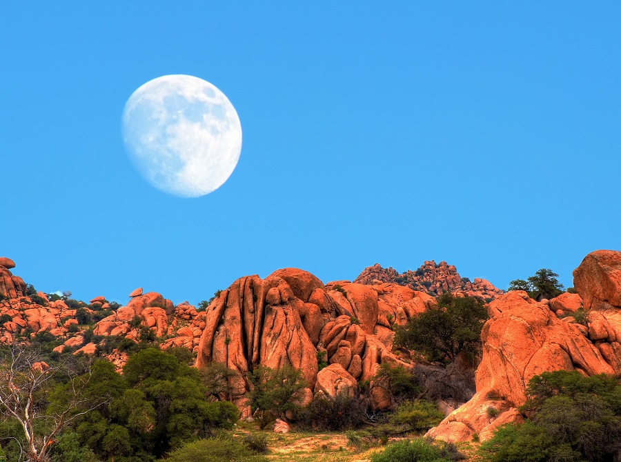 Desert moon over the southwestern USA desert and mountains