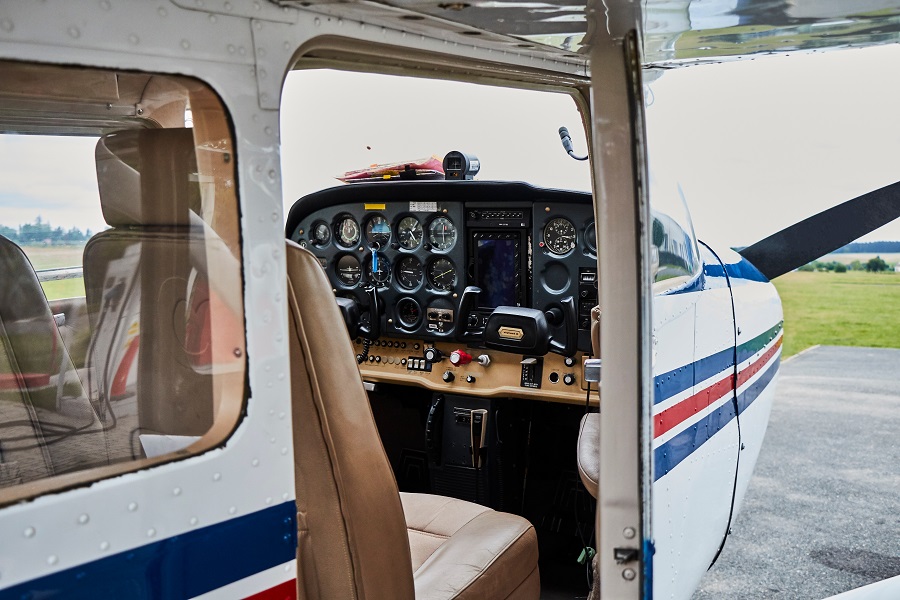 Detailed view of Cessna 172 Skyhawk 2 airplane interior standing on a runway.