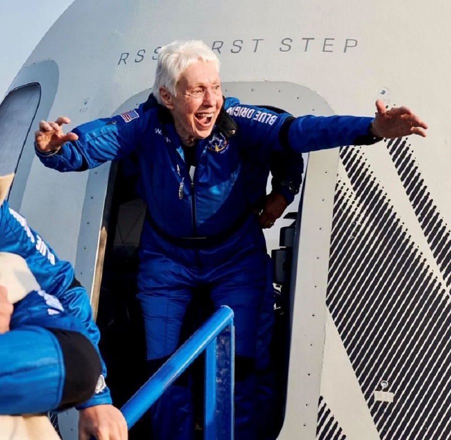 Official photo from their NS-16 mission (July 20, 2021), showing Wally Funk joyfully exiting the New Shepard crew capsule 