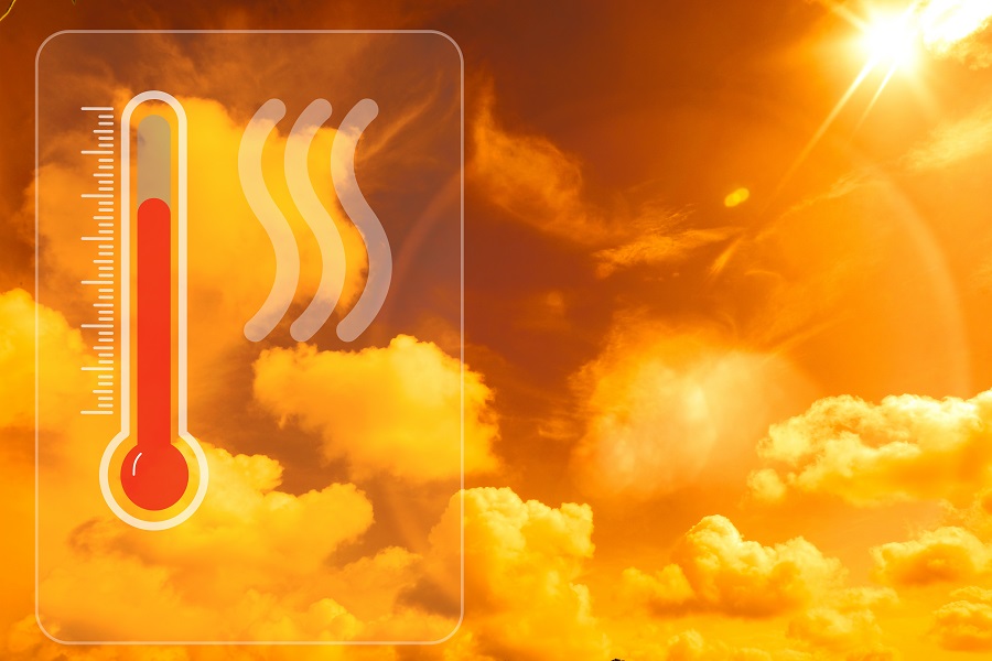 A thermometer and heat wave icon appear inside a transparent warning panel over an orange sky with bright sun and glowing clouds