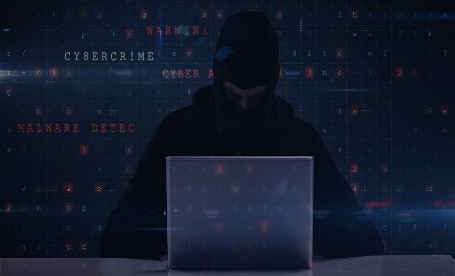 Image of caucasian male hacker over flag of russia and ukraine