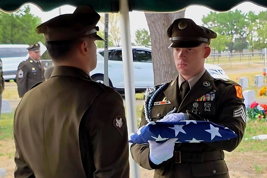New Mexico National Guard members folded the flag
